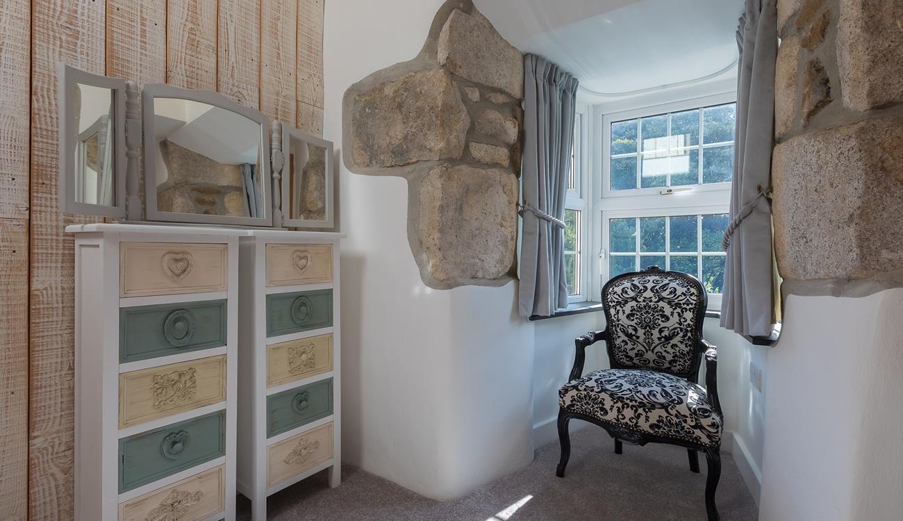 This quiet corner is perfect for tucking yourself away and enjoying a good book.