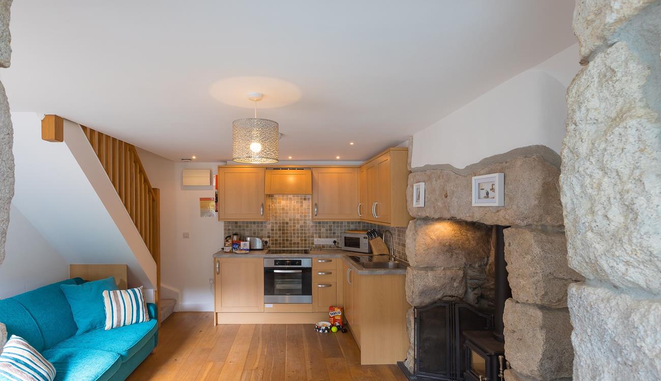 The kitchen has everything you need to cook a delicious meal for two. 