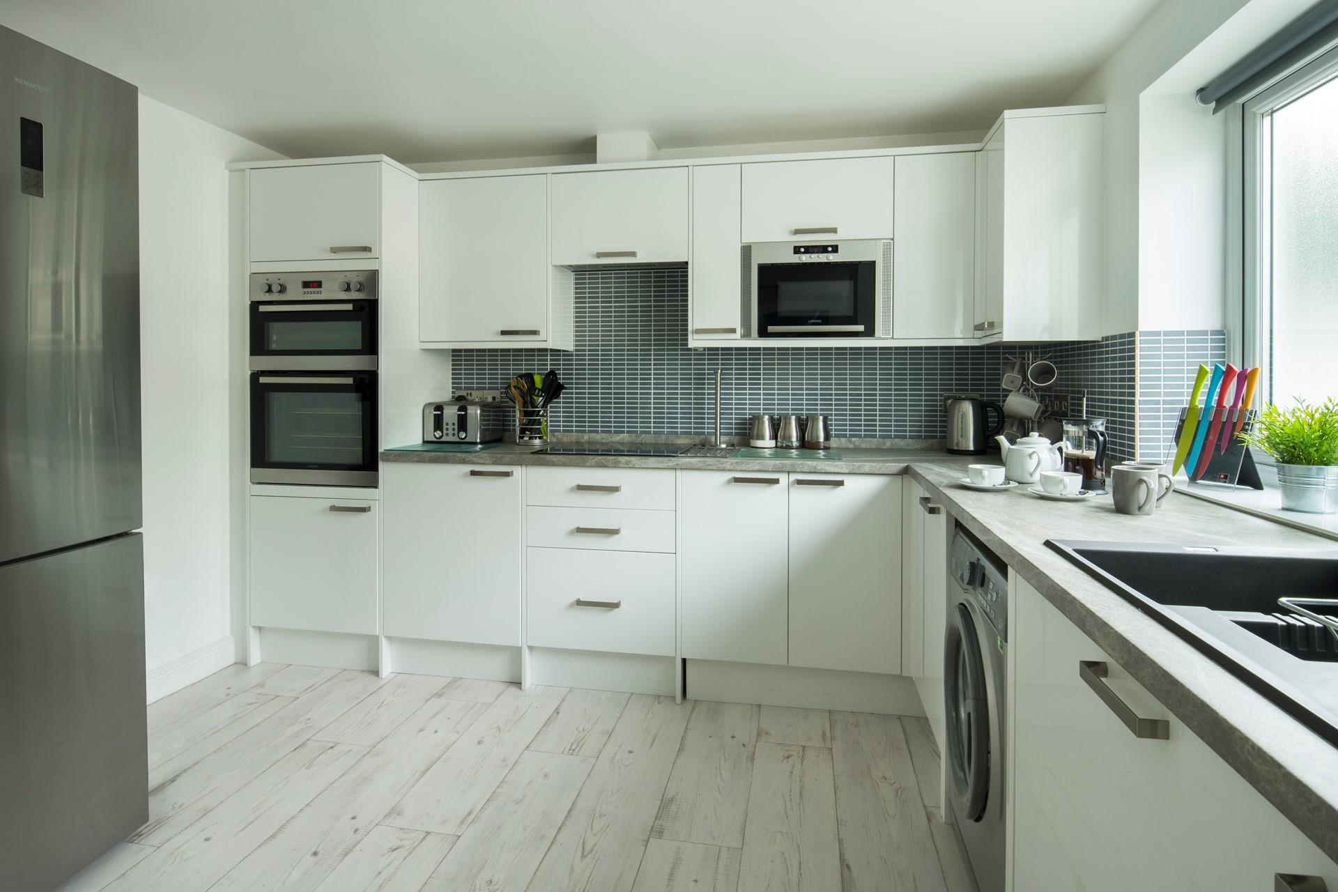 This modern kitchen has everything you will need to cook up some delicious treats. 