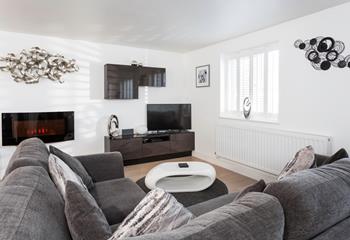 Relax into the sumptuous sofa and unwind after a busy day exploring the local area. 