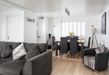 Finished to an incredibly high standard, the open plan living space is ideal for gathering together for a meal and drinks. 