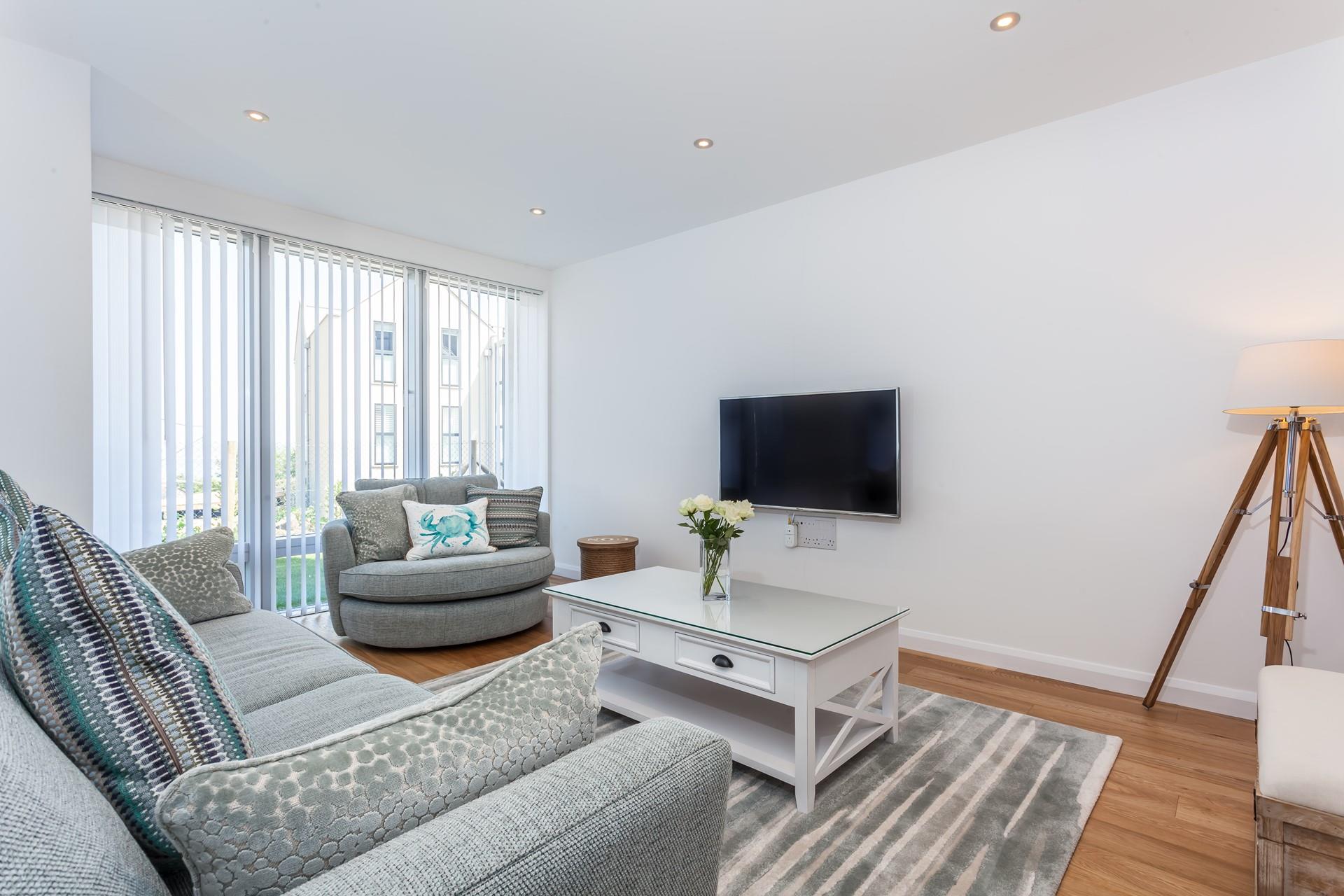 Enjoy a family movie night in the cosy sitting area.