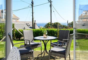 Pop open a bottle of wine and relax in your garden gazing out at your sea views.