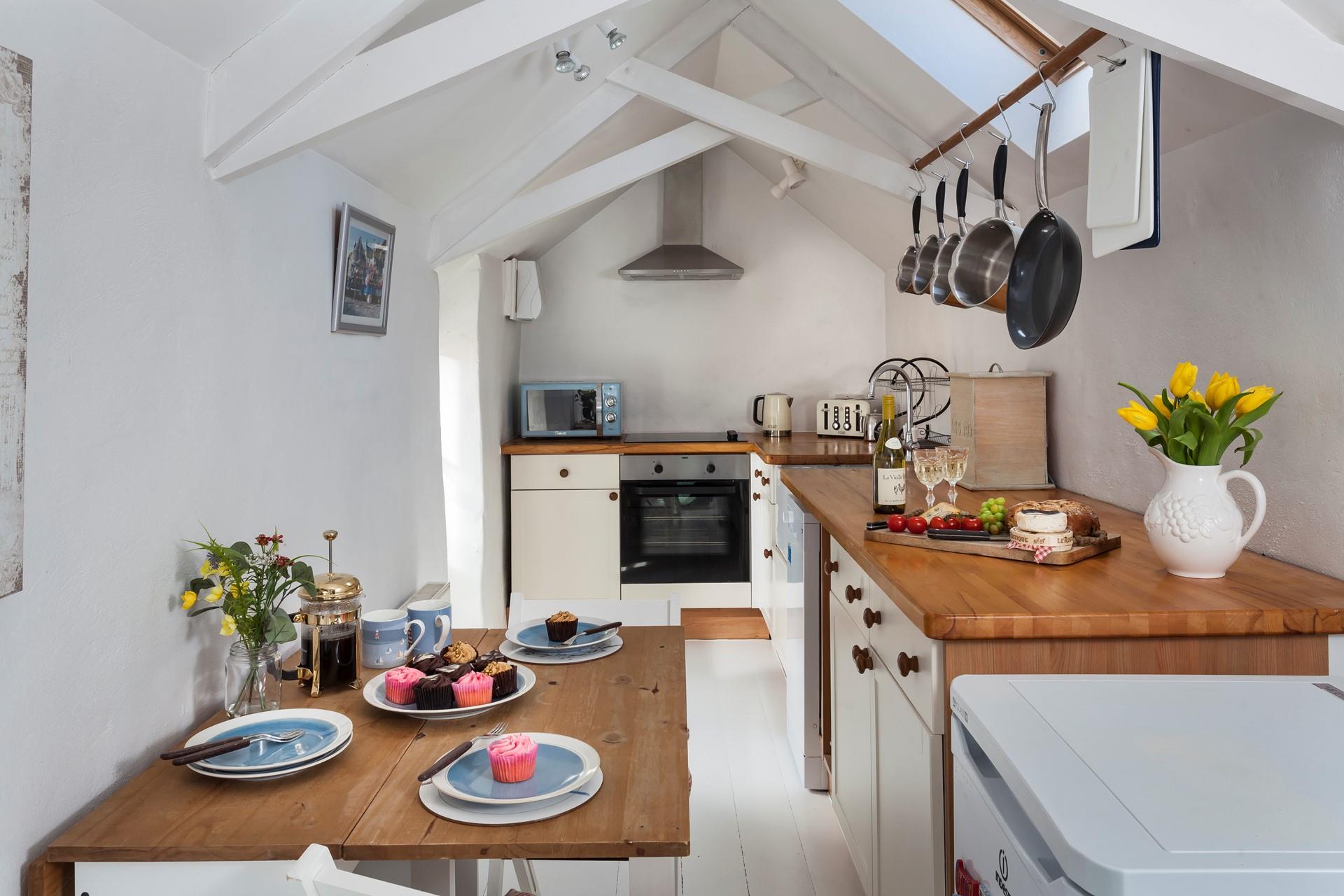 The kitchen is well-equipped for all your cooking needs.