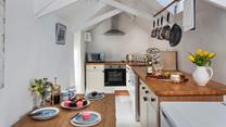 The kitchen is well-equipped for all your cooking needs.