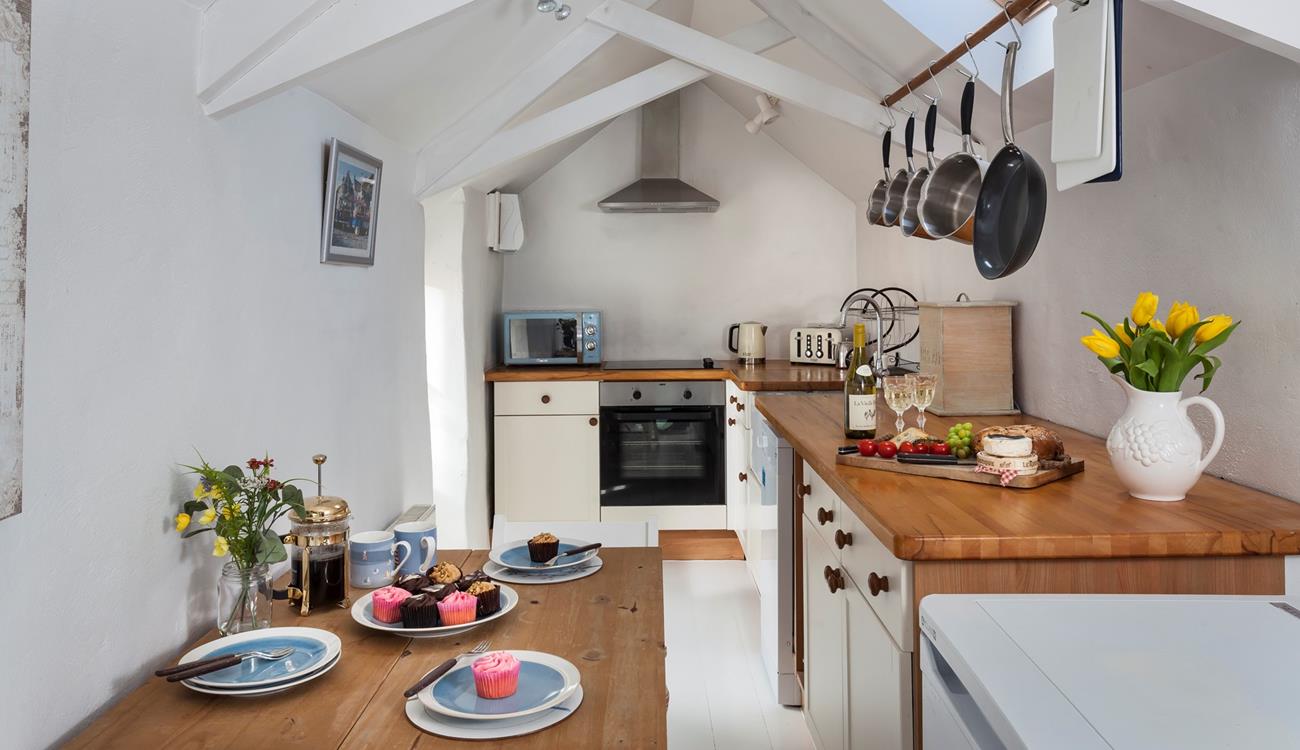 The kitchen is well-equipped for all your cooking needs.