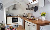 Cook a delicious meal for the family in the delightful kitchen. - Thumbnail Image