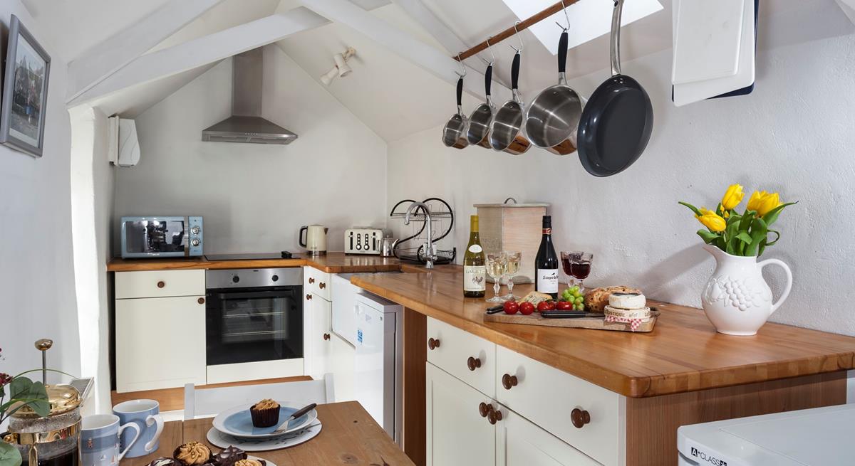 Cook a delicious meal for the family in the delightful kitchen.