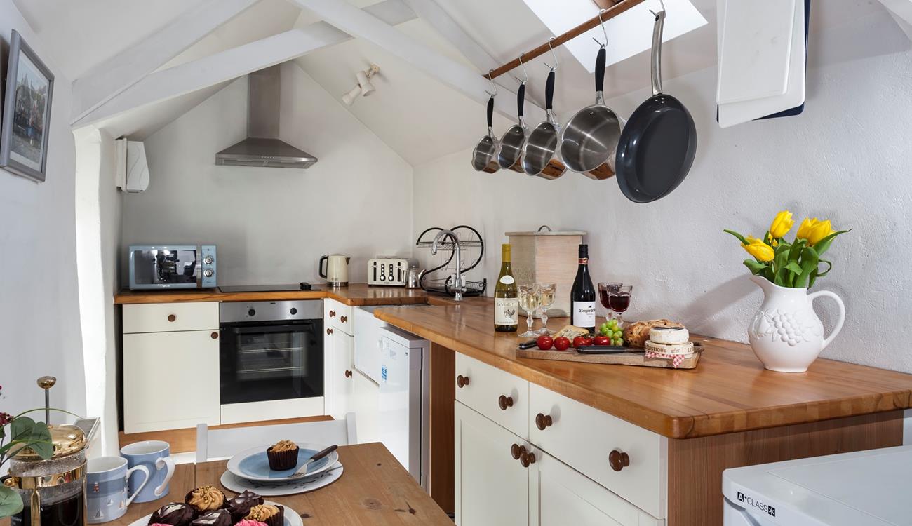Cook a delicious meal for the family in the delightful kitchen.