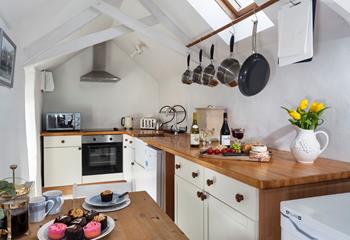 Cook a delicious meal for the family in the delightful kitchen.