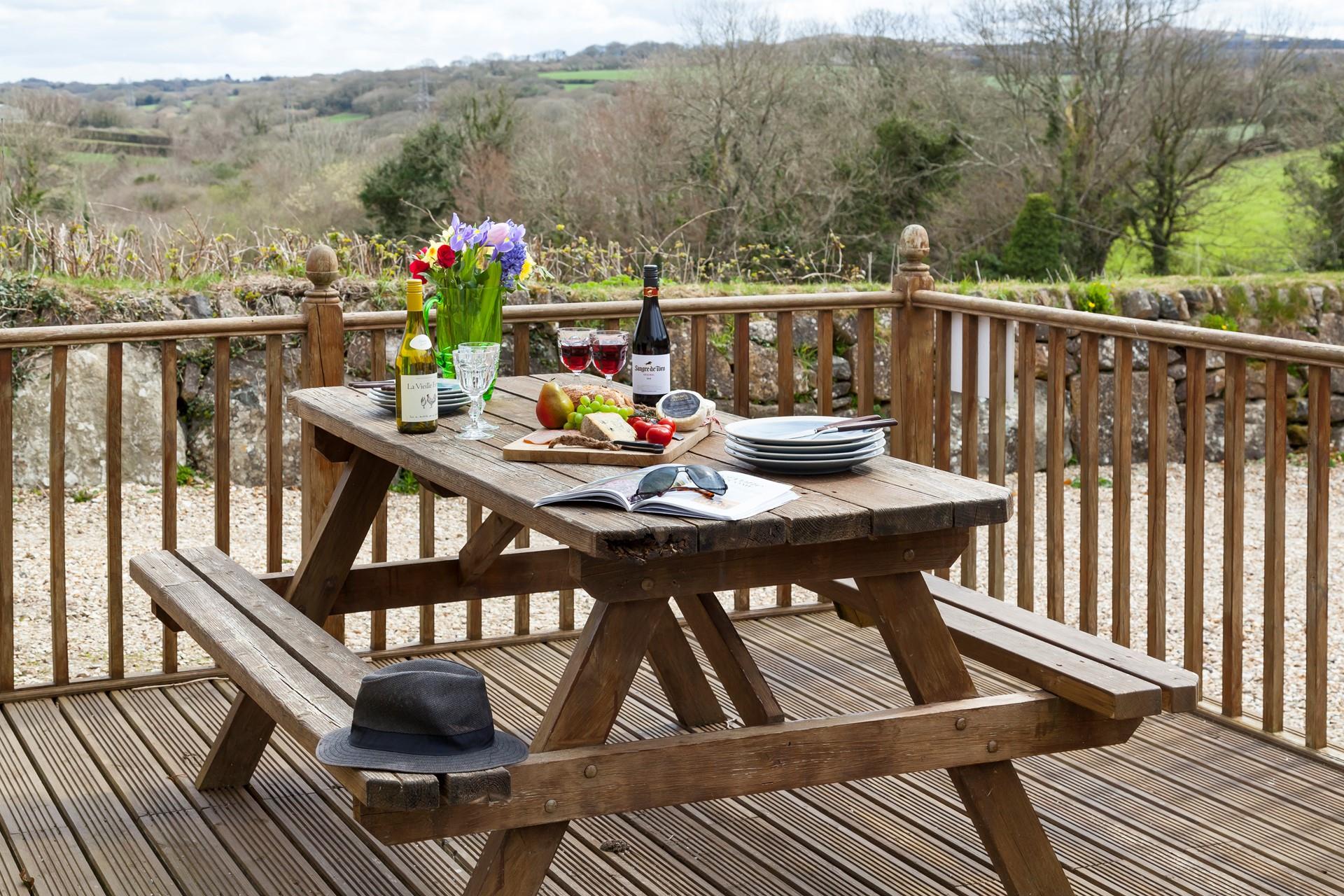 Enjoy alfresco dining on the enclosed decked terrace. 