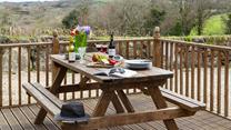 Enjoy alfresco dining on the enclosed decked terrace. 