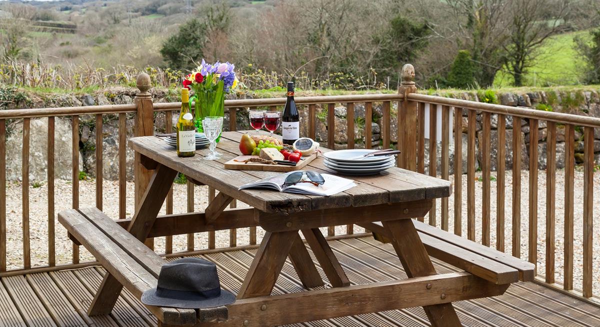 Enjoy alfresco dining on the enclosed decked terrace. 