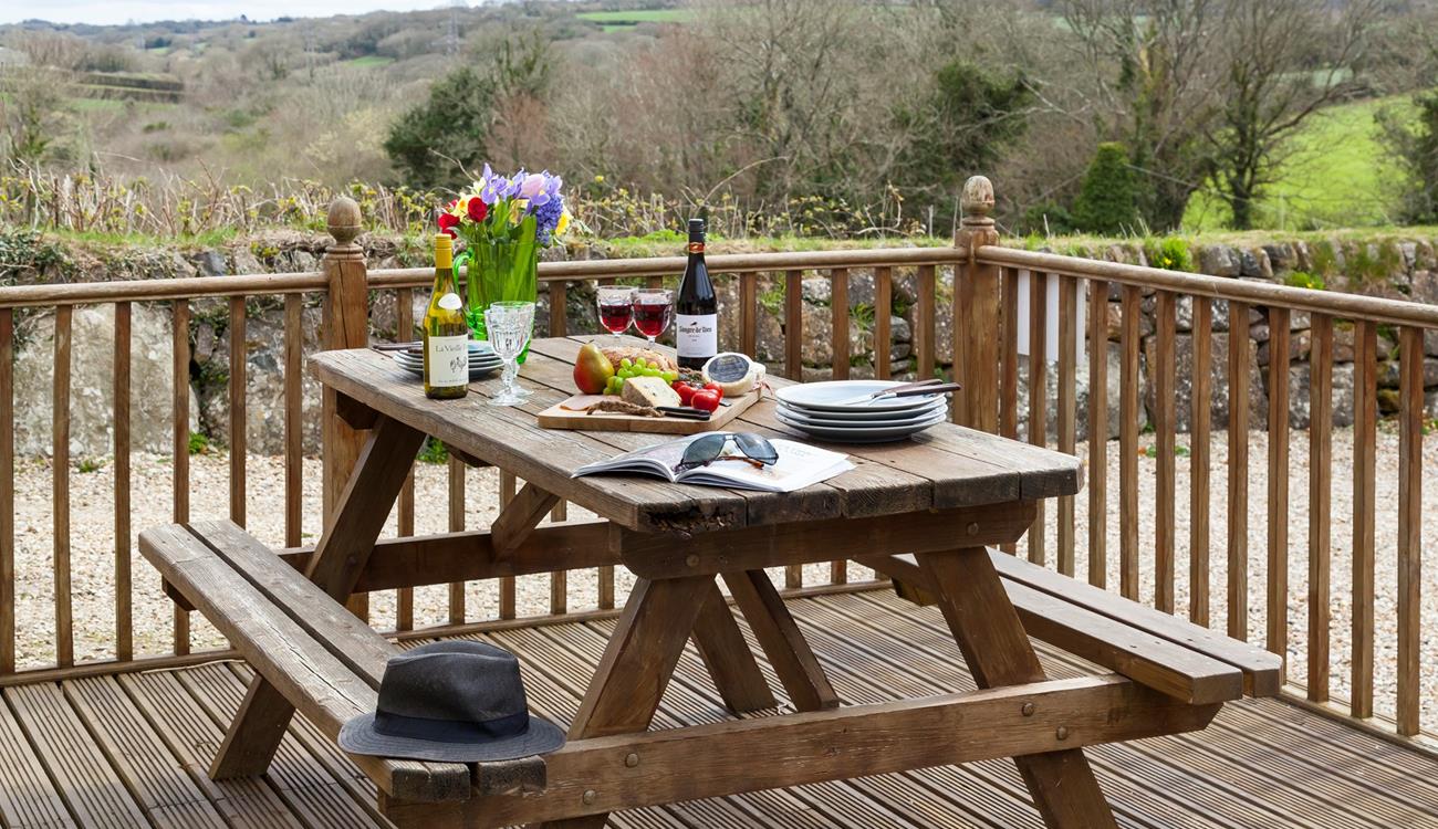 Enjoy alfresco dining on the enclosed decked terrace. 
