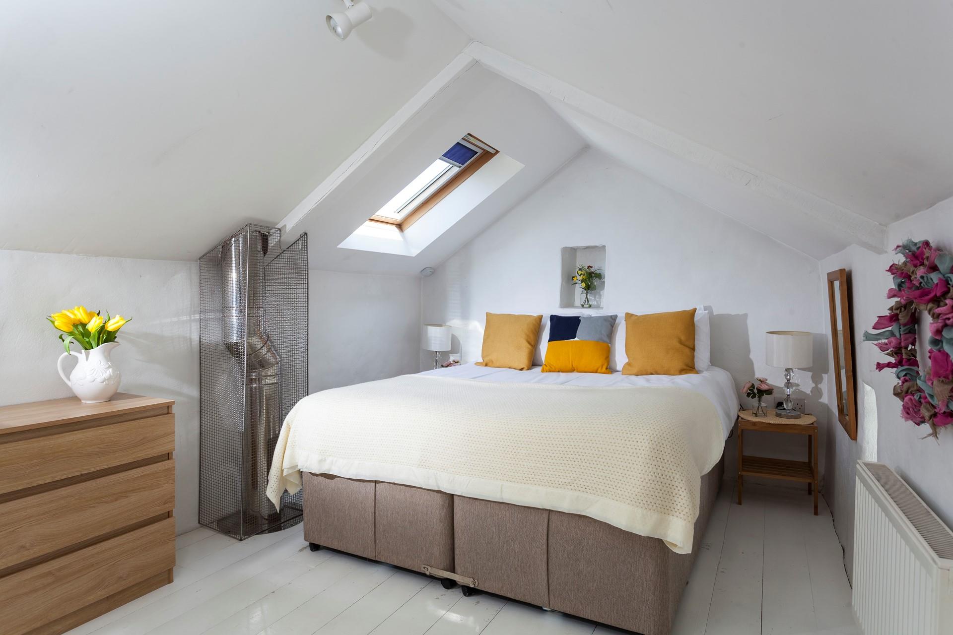 The king size bed provides a cosy night's sleep after a day of exploring.