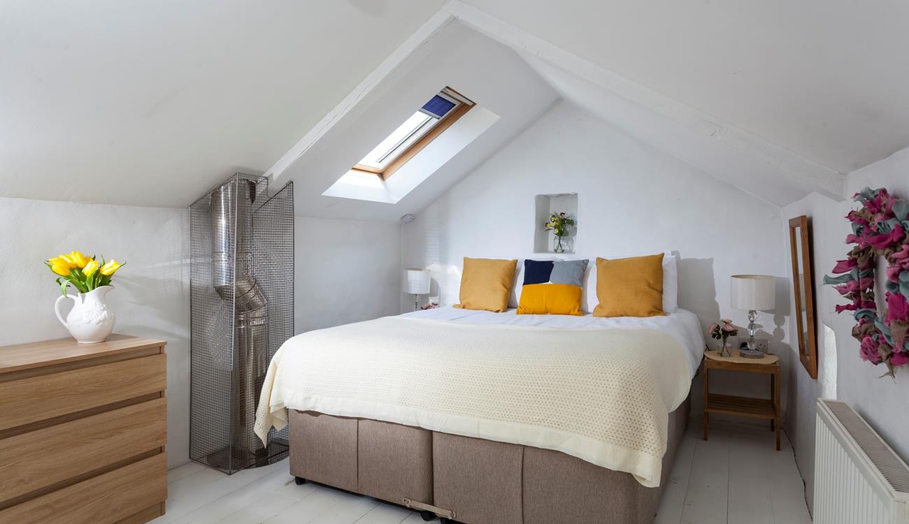 The king size bed provides a cosy night's sleep after a day of exploring.