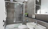 The bathroom has a large shower perfect for waking yourself up ready for the day. - Thumbnail Image