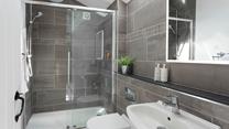 The bathroom has a large shower perfect for waking yourself up ready for the day.