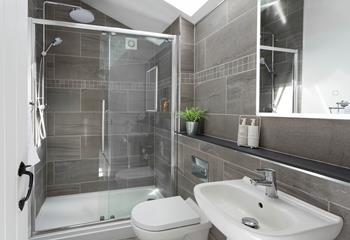 The bathroom has a large shower perfect for waking yourself up ready for the day.