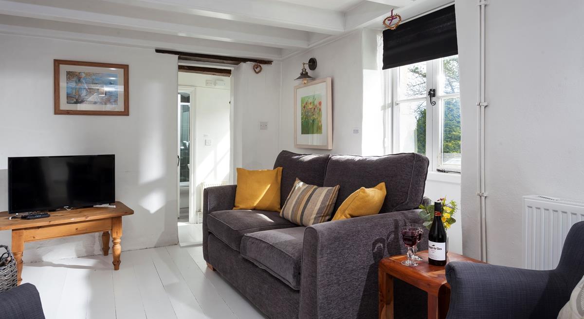 Enjoy a family evening in the homely sitting room. 