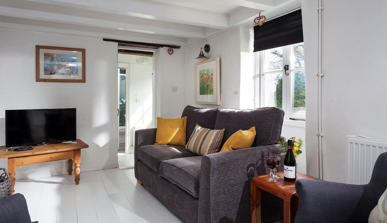 Enjoy a family evening in the homely sitting room. 