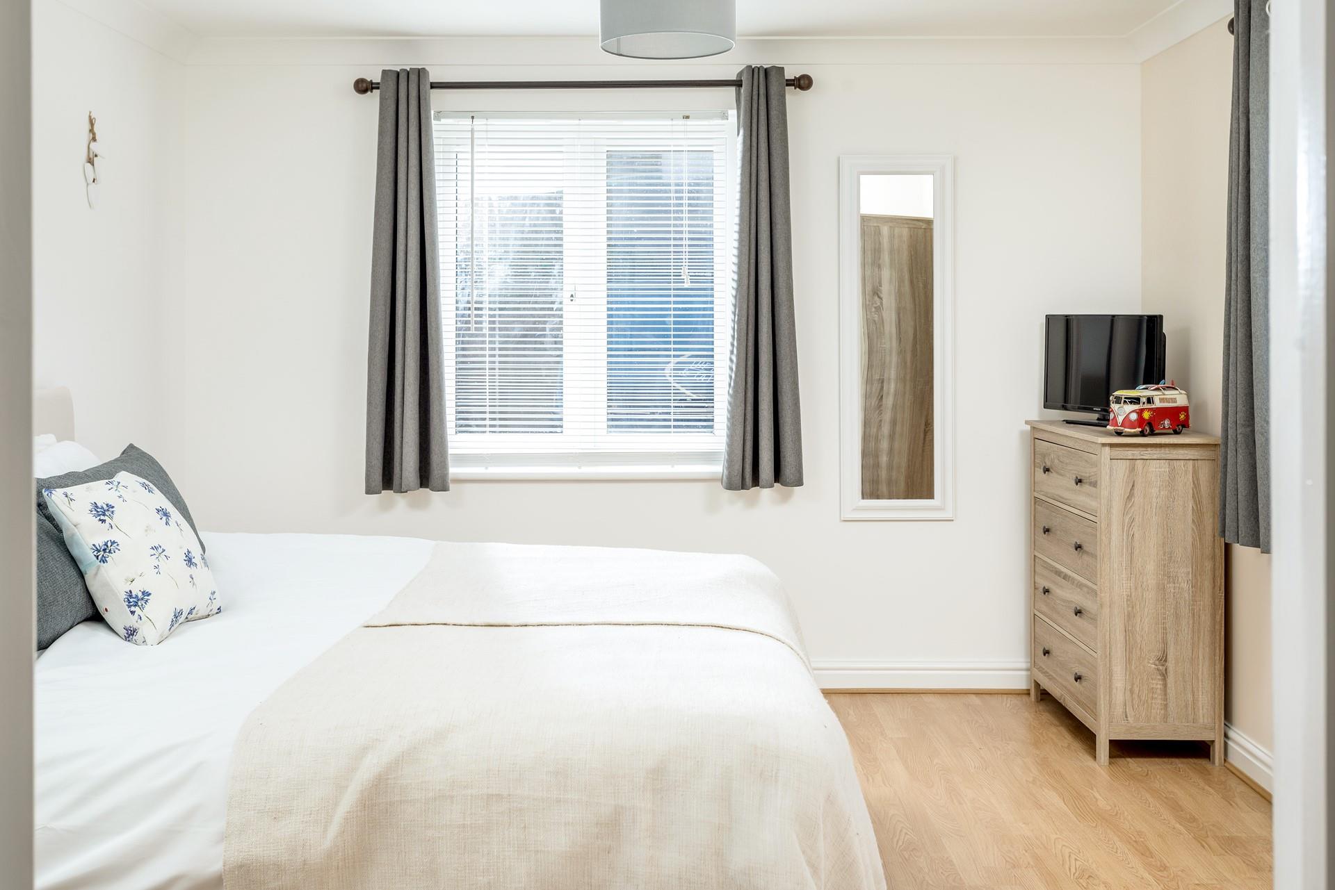 Bedroom 2 is on the car park side of the apartment block. 