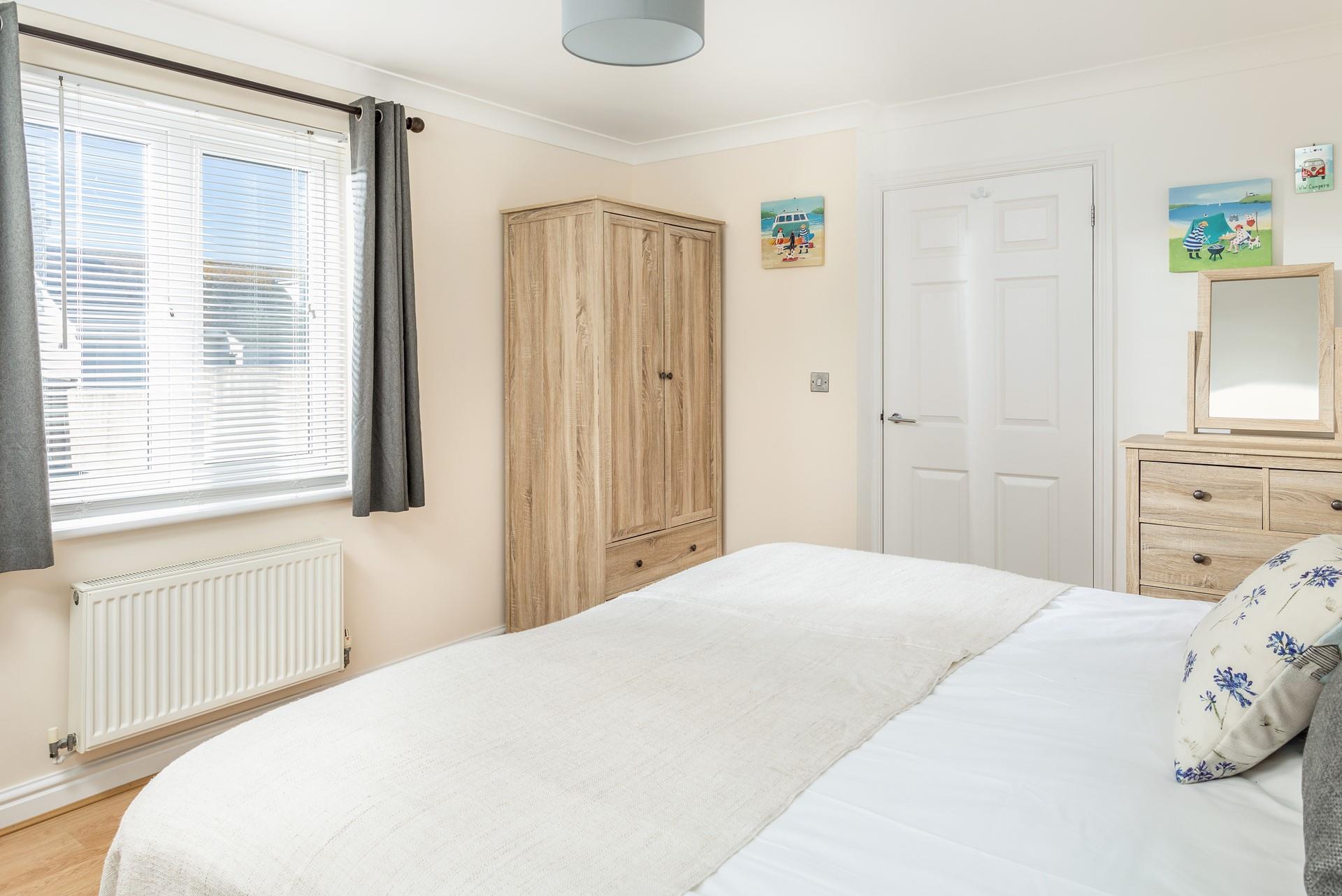 Bedroom 2 offers flexible sleeping arrangements, with zip and link beds that can be made as either twin or super king.