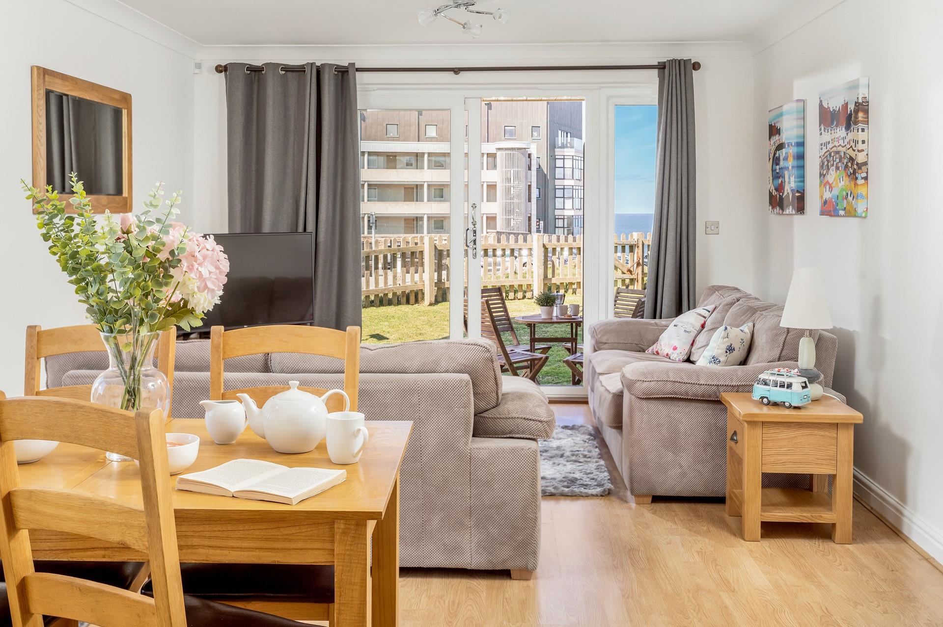 The doors lead to the communal outside area and are great for letting fresh air flow through the apartment. 