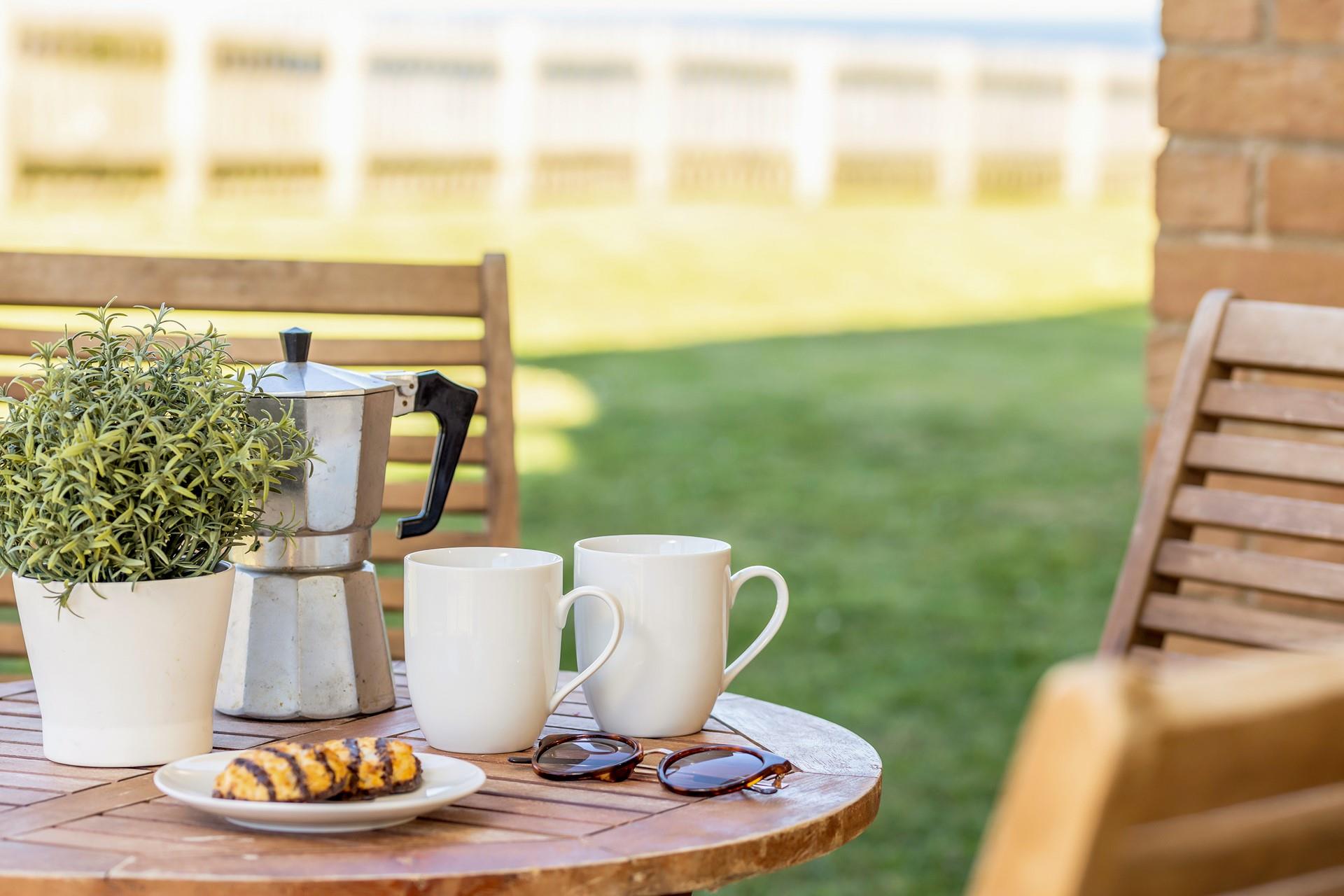 Sit outside on the lawn sipping a hot cup of tea.