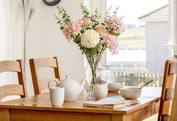 Sit around the table as a family and enjoy a tasty cooked meal or takeaway.