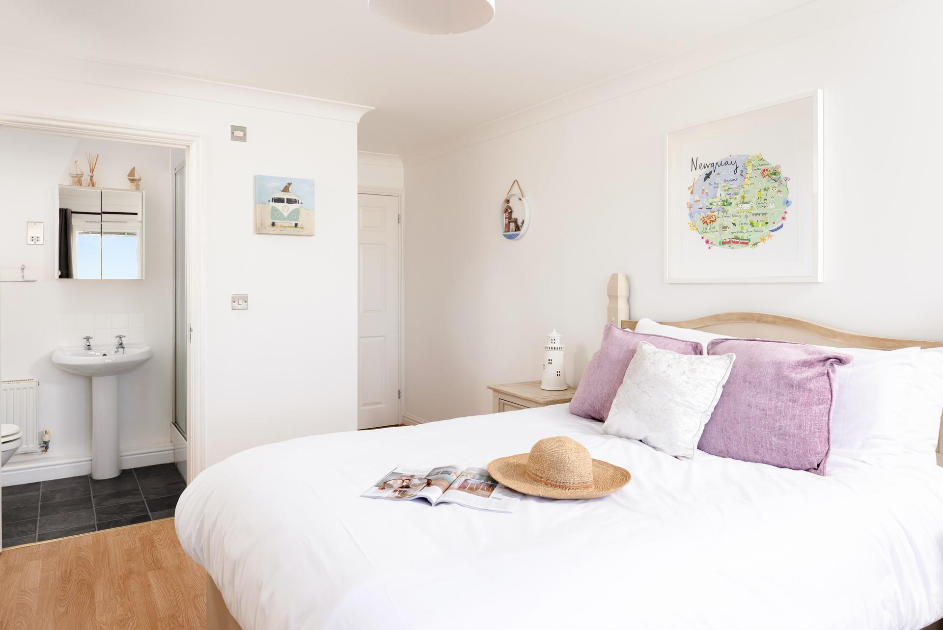 Get ready in the ensuite bathroom and head out to the beach.