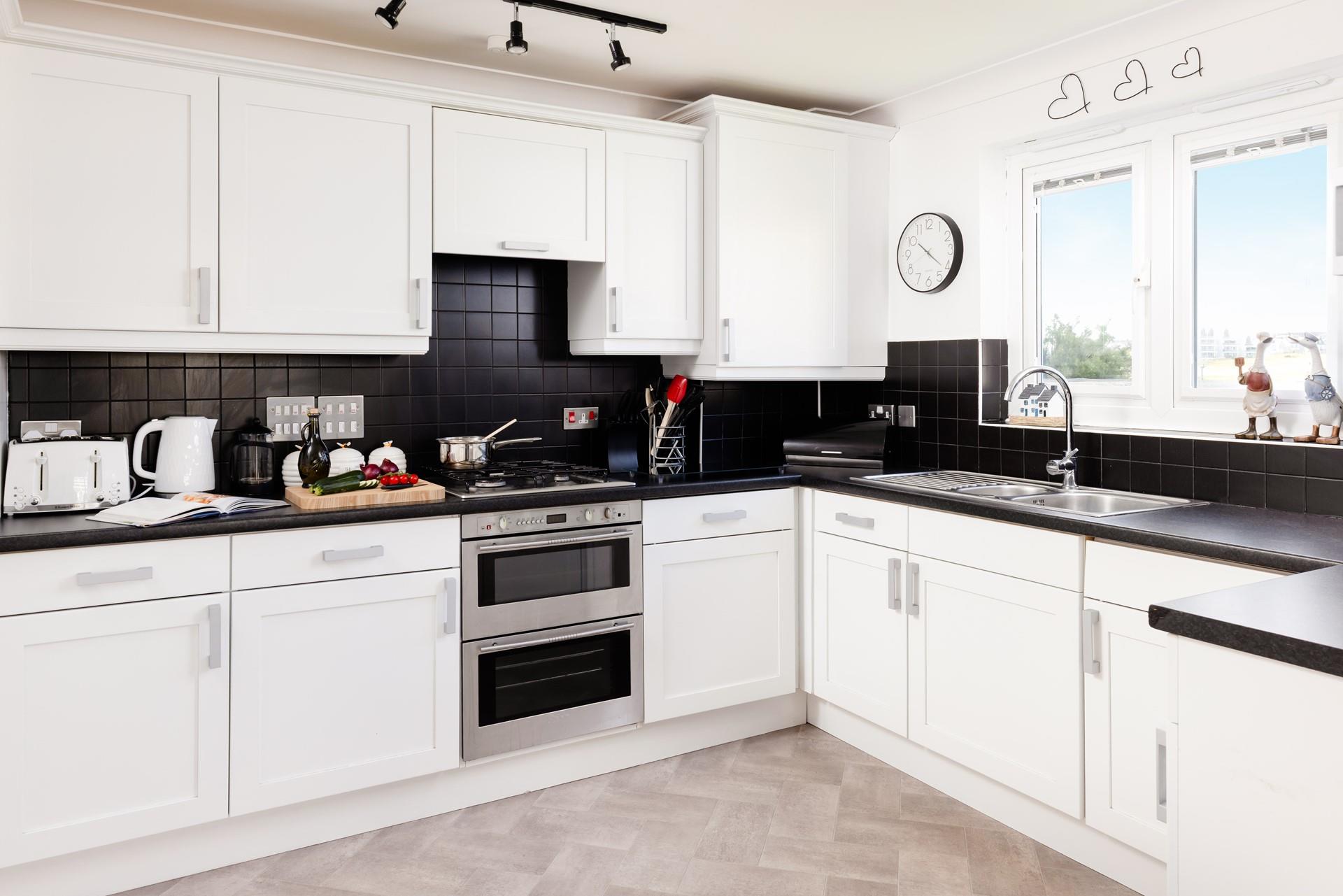 The kitchen is stylishly designed and well-equipped, perfect for cooking up a feast.