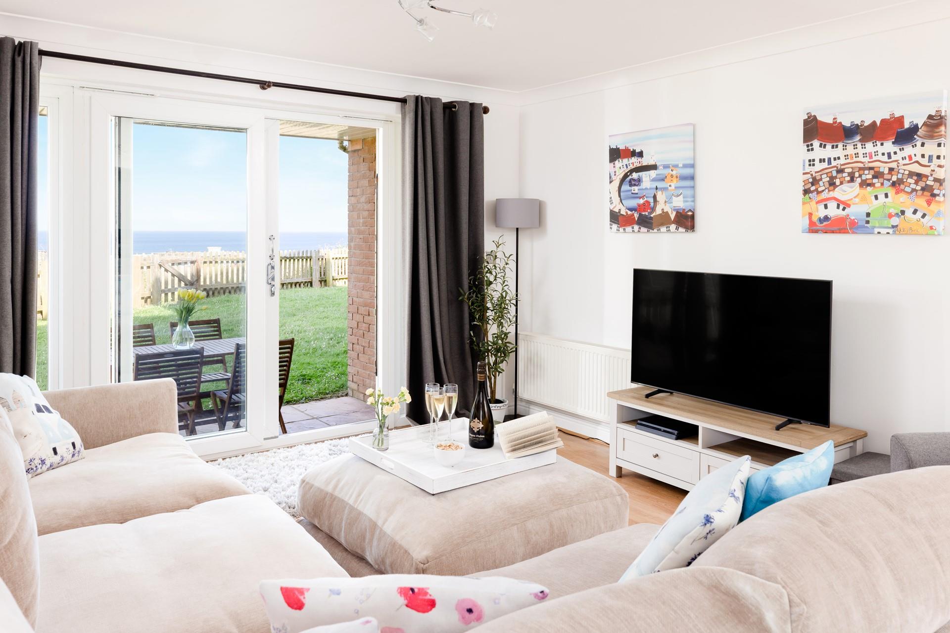 With a large sofa, there is ample space for the whole family to relax and socialise. 