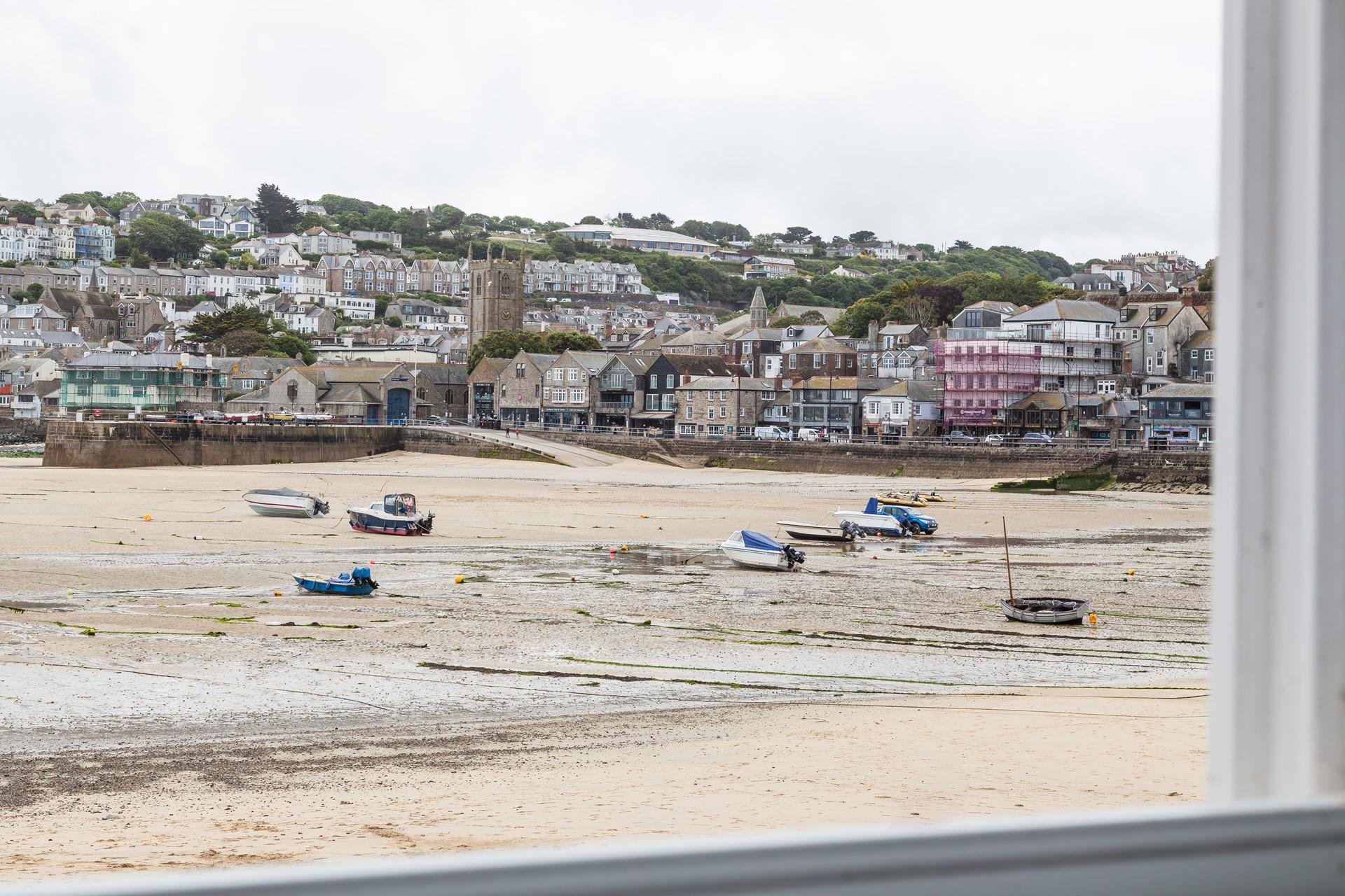 Rise early and enjoy a barefoot stroll along the sand whilst listening to St Ives' slowly wake up.