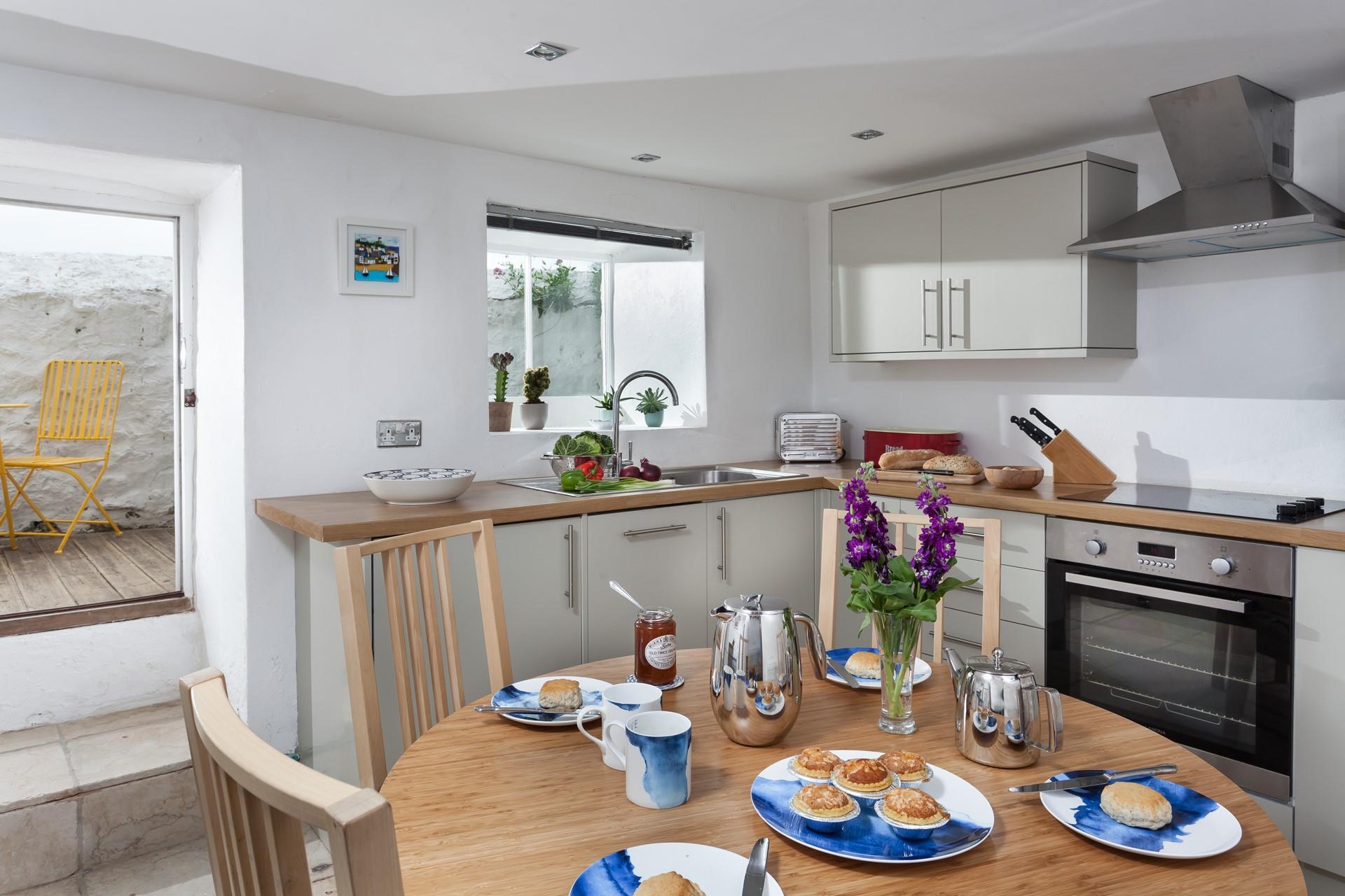 The dining table has ample room for three to enjoy meals together.