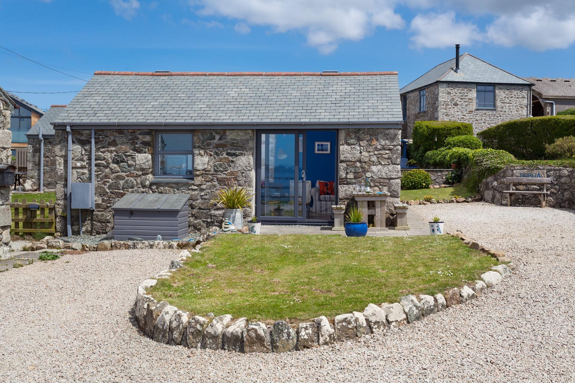 Sit in your garden and take in the stunning sea views across the Mount.