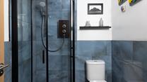 The coastal theme continues in the wet room.