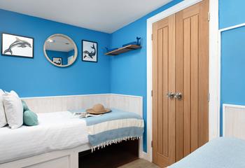 Stylish coastal artwork is dotted throughout the cottage.