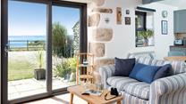 The light and bright living area makes the most of the view!