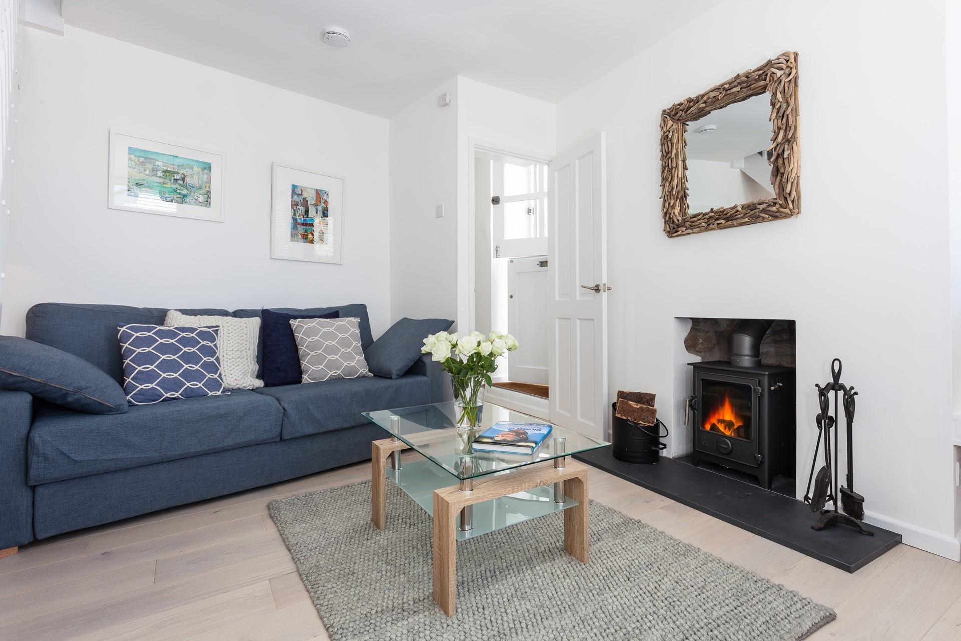 The sitting room is light and cosy, perfect for all seasons.