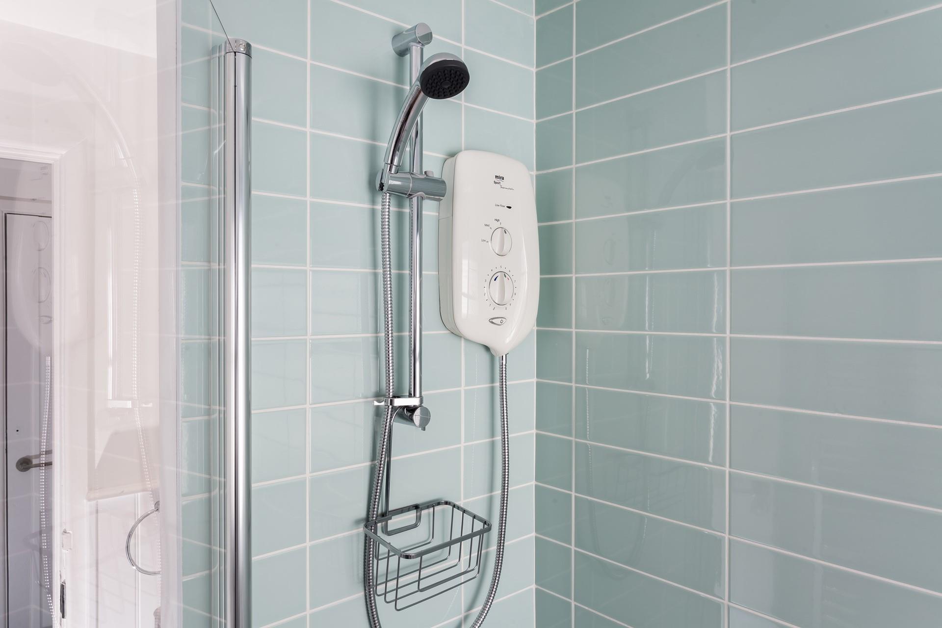 Wash off sandy toes in the shower after a day on Mousehole beach.