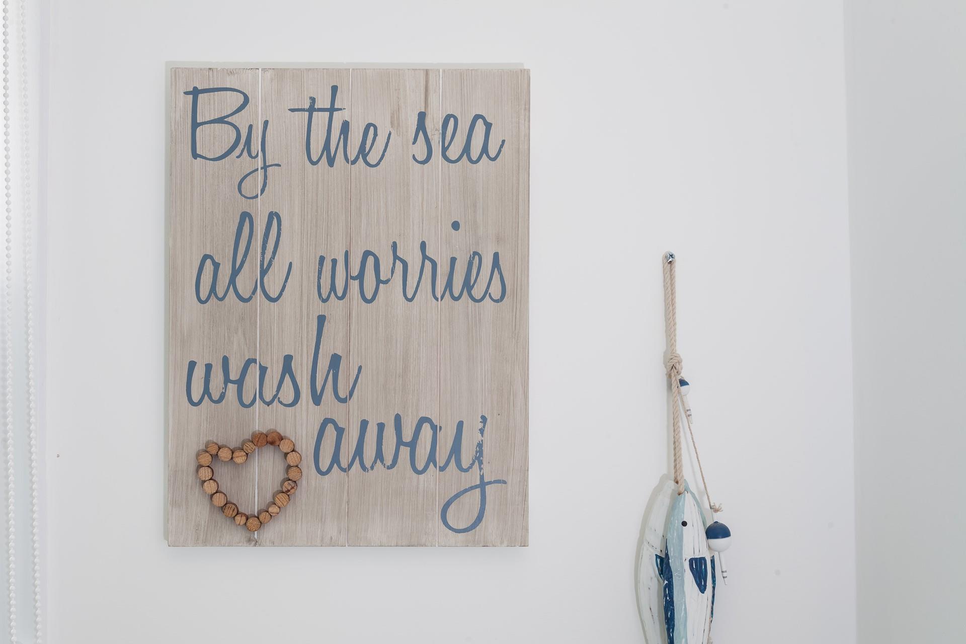 Tasteful seaside decor welcomes you.