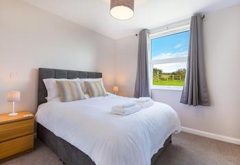 Wake up to glorious countryside views after a comfortable sleep in the king size bed. 