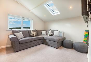 Godrevy Heights boasts a light and airy top floor snug with views across Trencrom Hill. 