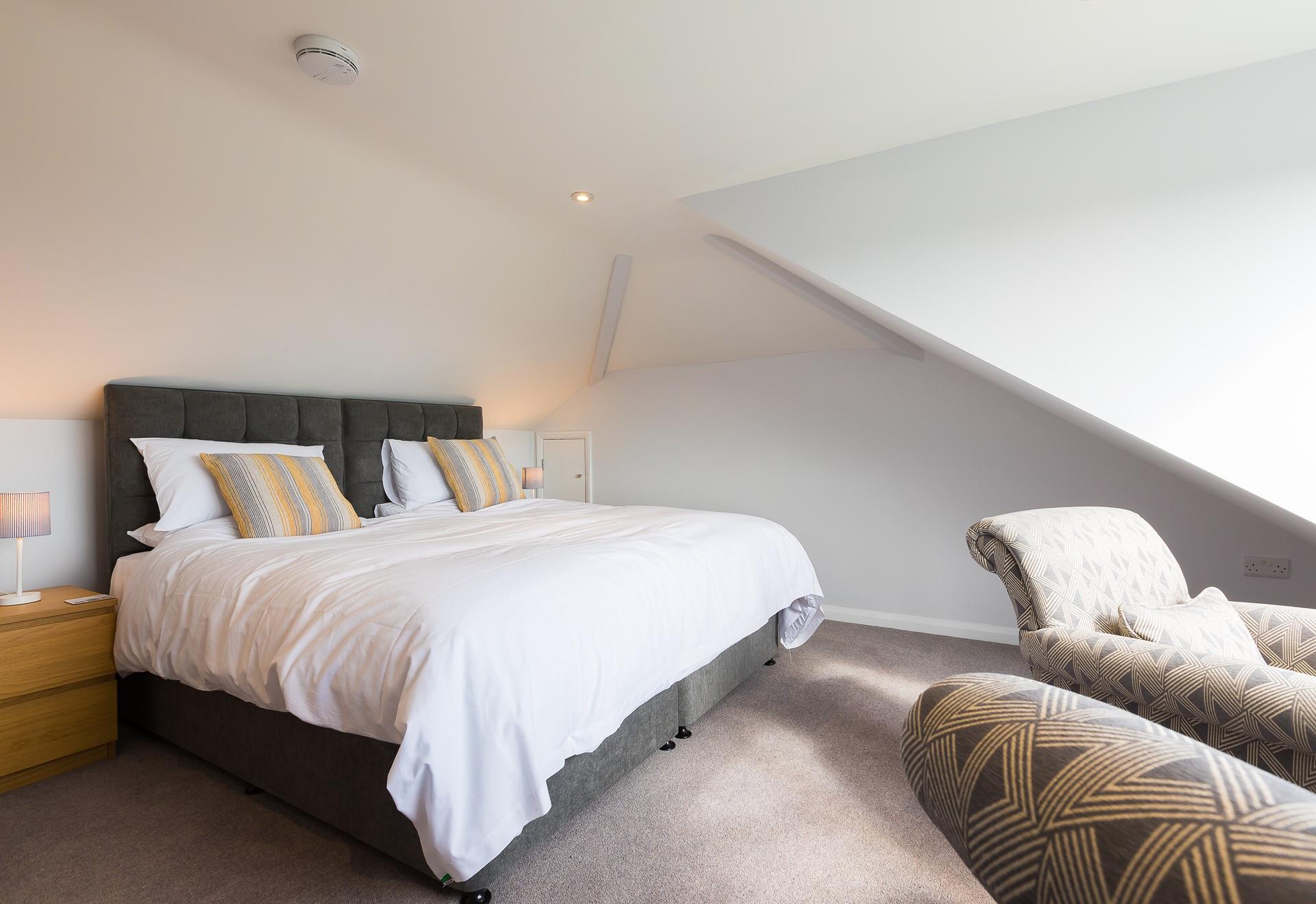 Sink into the sumptuous super king size bed for a blissful night's sleep. 