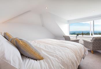 With elevated views across the countryside and towards the sea, bedroom 1 has the best vantage point in the house. 