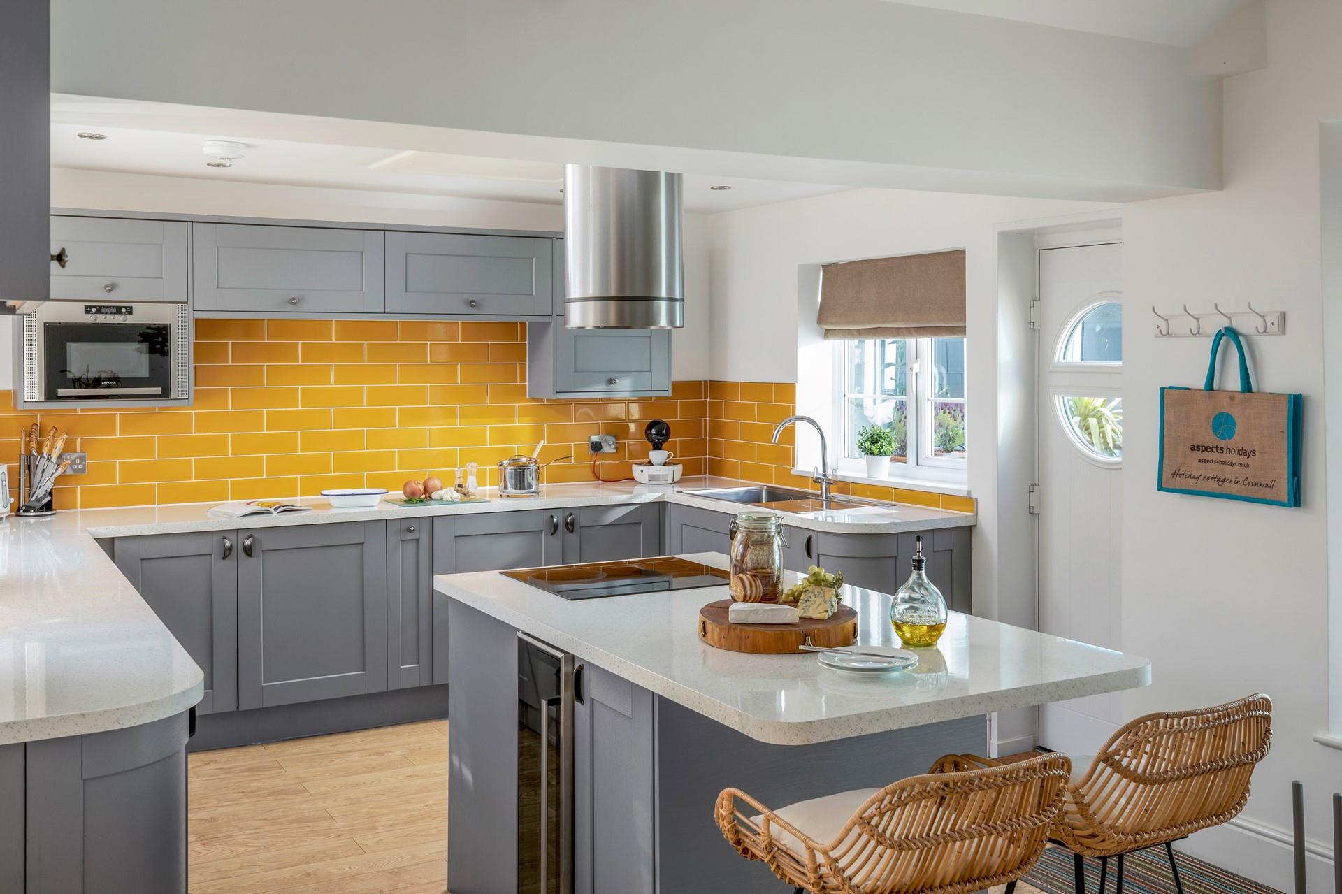 On dry days, throw open the kitchen door and let the fresh air drift into the kitchen.