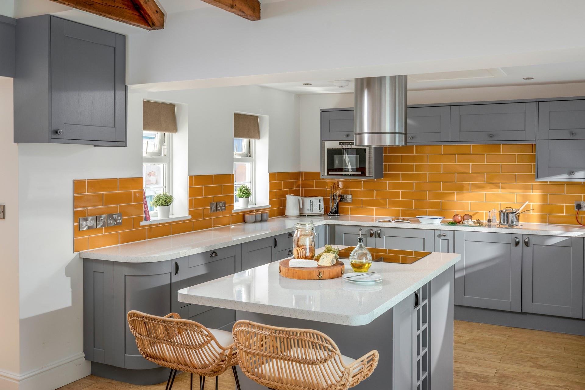 You'll love the bright and colourful kitchen. 