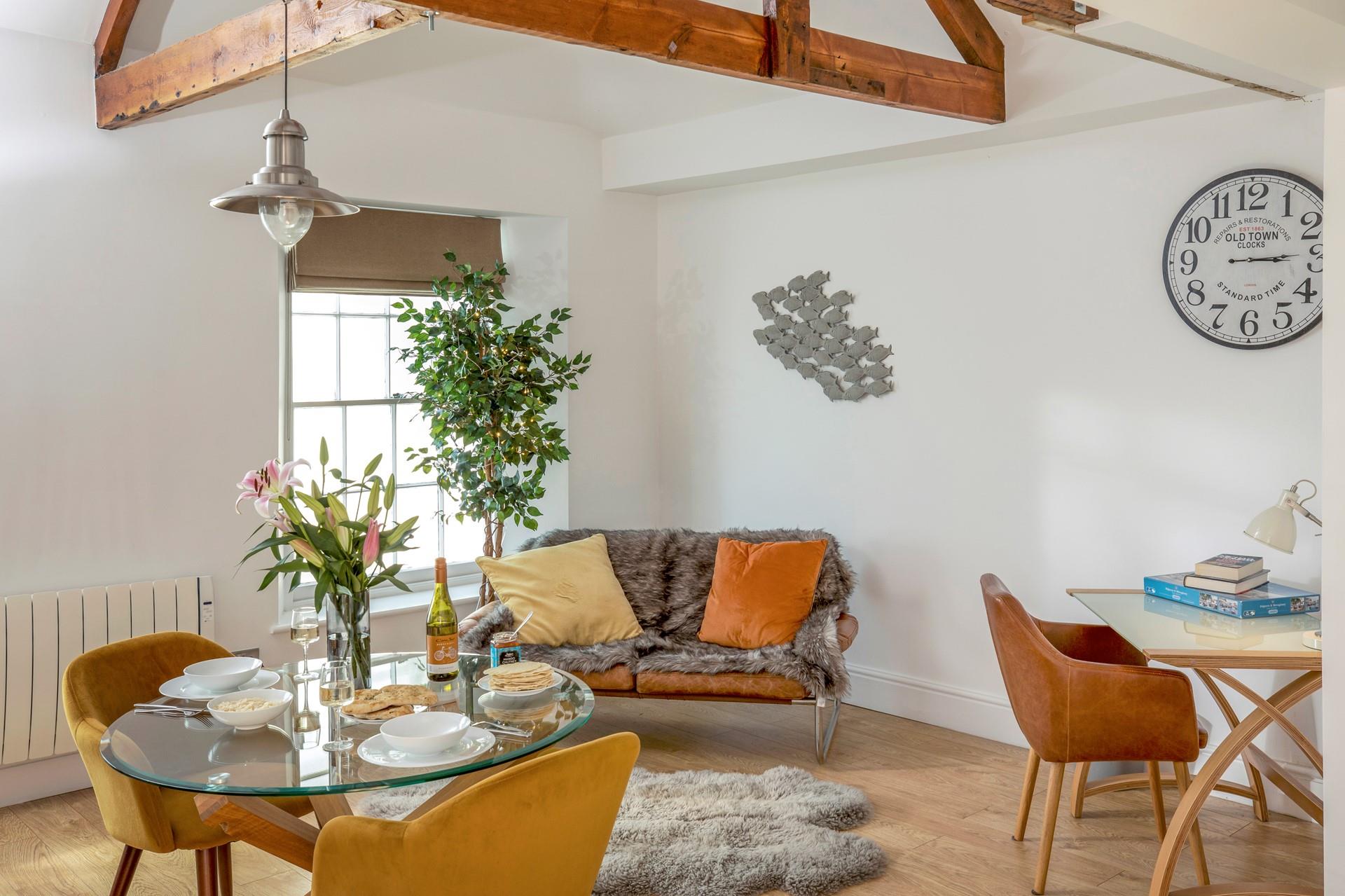 Chic and stylish, the open plan dining area offers plenty of space for the two of you and your four-legged friend.