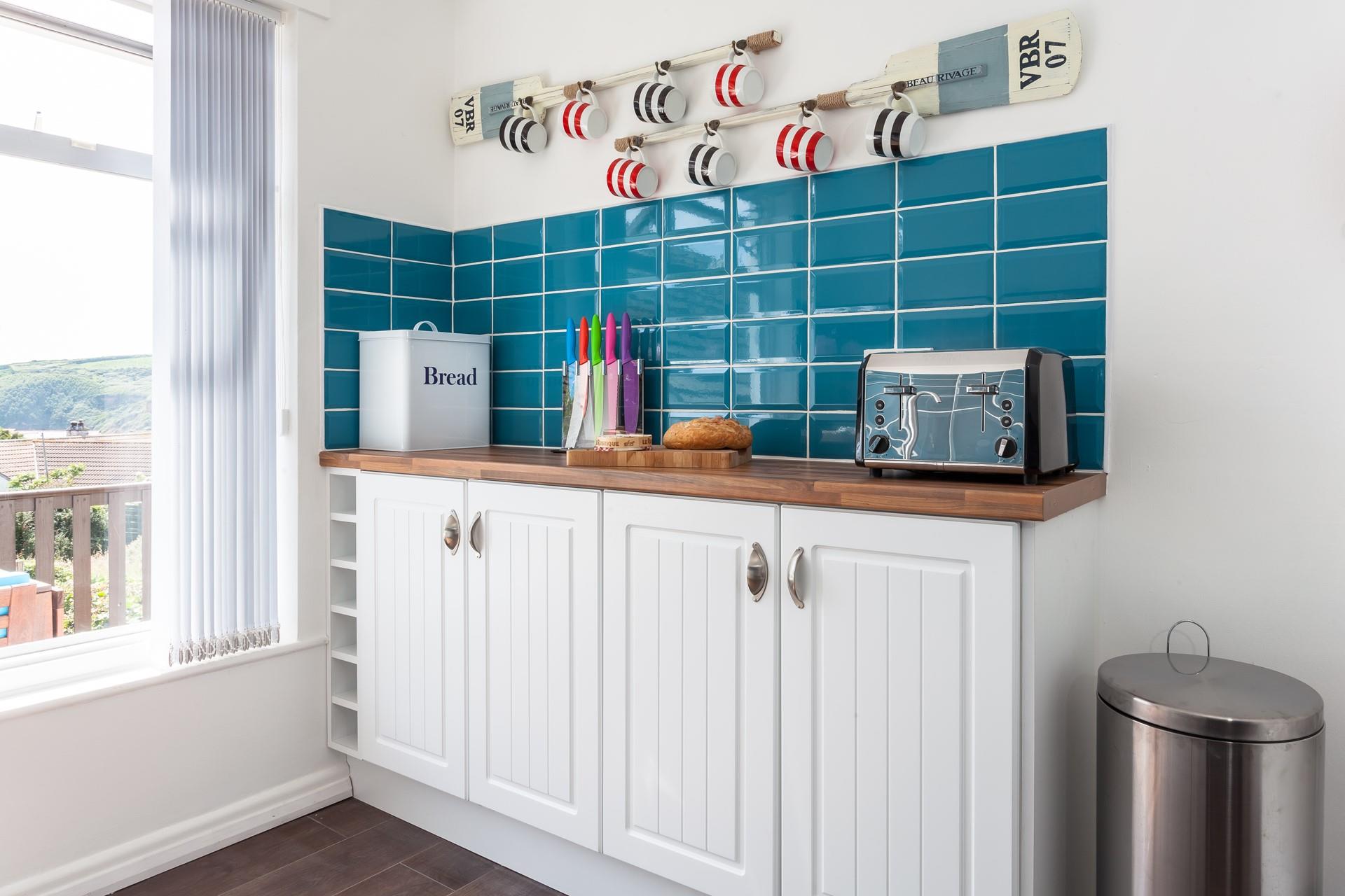 We love the clever decor, perfect for grabbing a mug to make yourself your favourite hot drink to enjoy whilst looking out at the view!